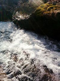 Waves splashing on rocks