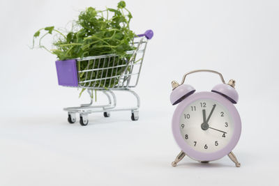 Close-up of clock against white background