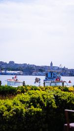 Scenic view of bay against clear sky