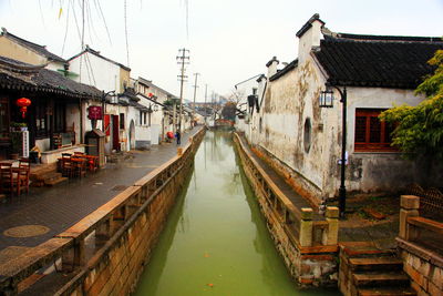 Narrow canal along buildings