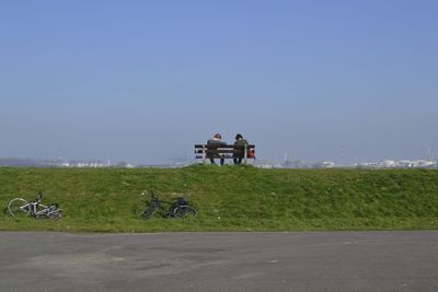 People in park against clear sky