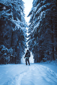 Full length of person on snow covered field