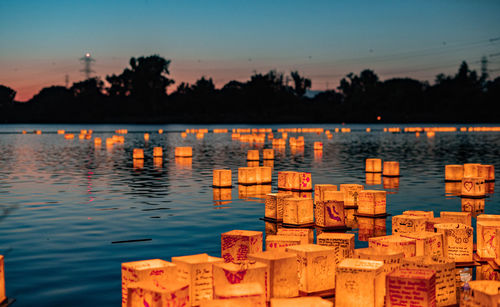 Illuminated buildings in water