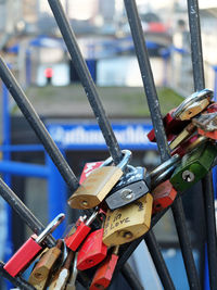 Close-up of padlocks on railing