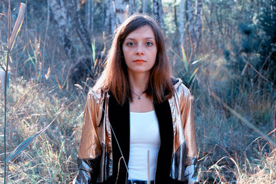 Portrait of beautiful woman in forest