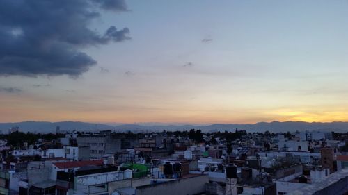 High angle shot of cityscape against sky