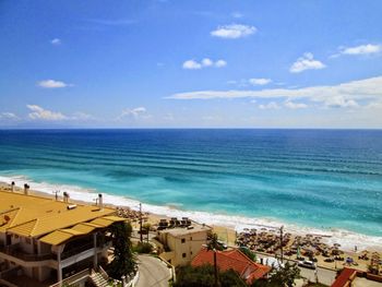 View of beach against cloudy sky