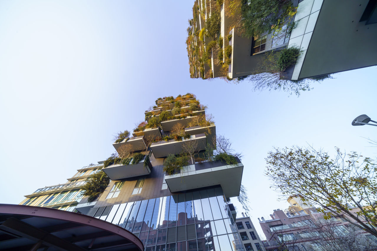 LOW ANGLE VIEW OF BUILDINGS AGAINST CLEAR SKY