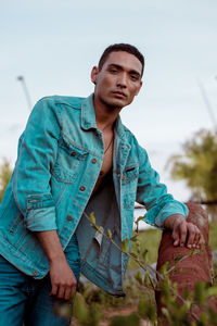 Portrait of young man looking away