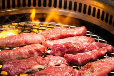 Close-up of meat on barbecue grill