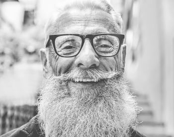 Close-up portrait of smiling senior man