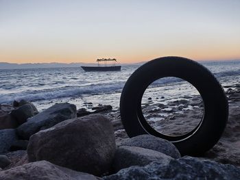 Scenic view of sea against sky during sunset