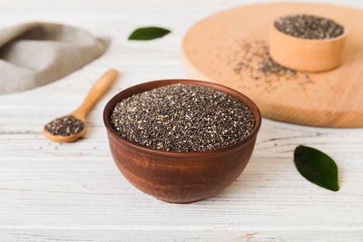 Close-up of roasted coffee beans on table