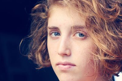 Close-up portrait of young woman