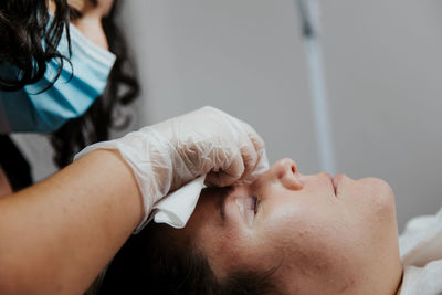 Midsection of woman lying down