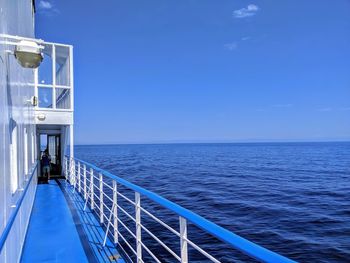 Scenic view of sea against blue sky