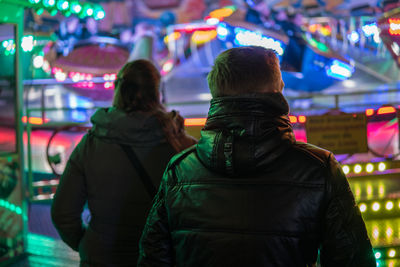 Rear view of people in amusement park