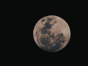 Full moon against clear sky at night