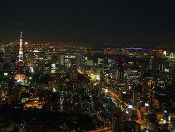 Illuminated cityscape at night