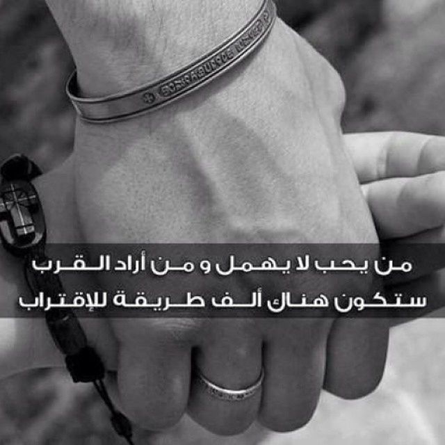 text, western script, communication, person, close-up, focus on foreground, part of, men, lifestyles, midsection, non-western script, holding, indoors, mid section, unrecognizable person, human finger, cropped