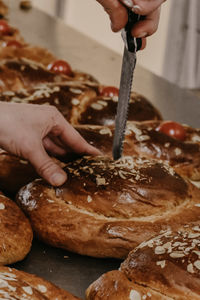 Cropped hand preparing food