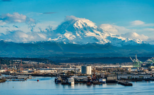 Mount rainier towers over the port of tacoma in washington state.