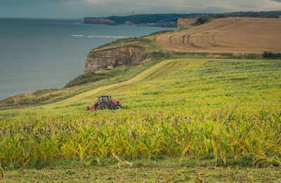 Agricultural machinery on landscape