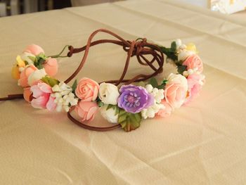 Close-up of pink roses on table