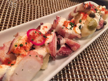 Close-up of octopus tentacles served on table