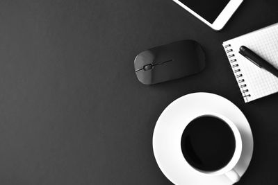 High angle view of coffee cup on table