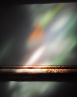 Defocused image of multi colored light against sky