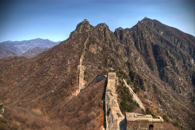 Great wall of china and mountain against blue sky