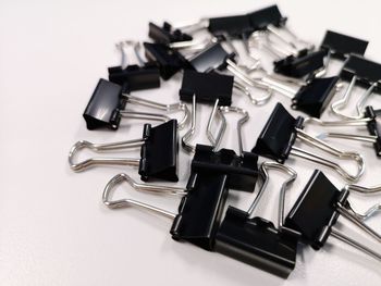 High angle view of objects on table against white background