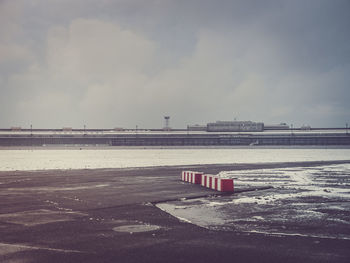 Built structure against cloudy sky