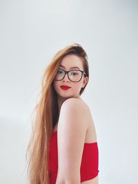 Portrait of young woman in eyeglasses