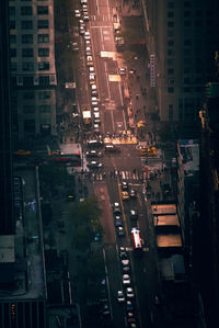 High angle view of traffic on city street at night