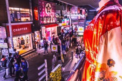 People on city street at night