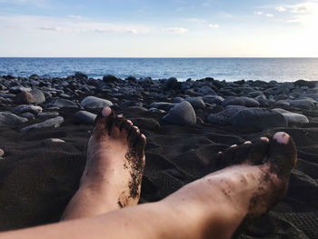 Low section of person on beach