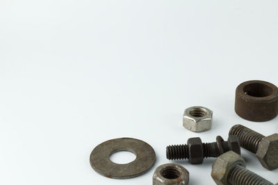 High angle view of objects on table against white background