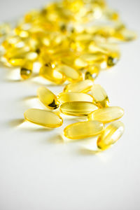 Close-up of pills on white background