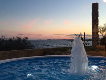 Scenic view of sea at sunset