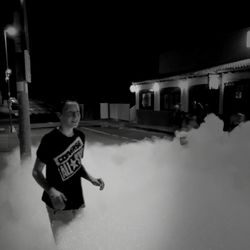 Full length of man in snow during night