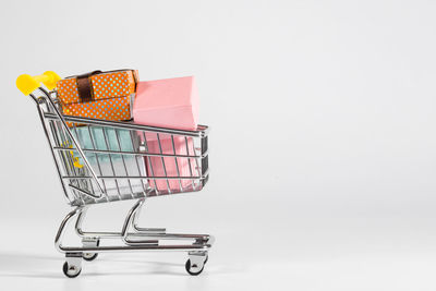 The full cart of gifts, on white a background. purchases