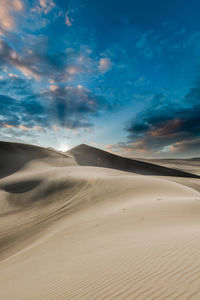 Scenic view of desert against sky