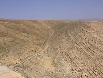 Scenic view of desert against clear sky