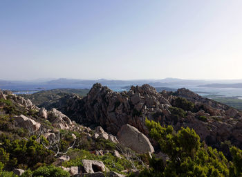 Scenic view of rocky mountains against clear sky