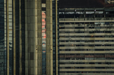 Full frame shot of modern glass building in city