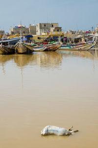 Boats moored at beach