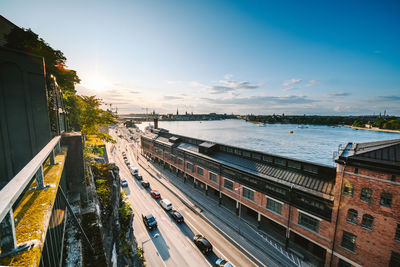 High angle view of road by building against sky