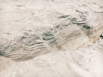 High angle view of sand on shore